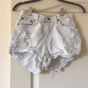 White high waisted jean shorts. Tight body fitting